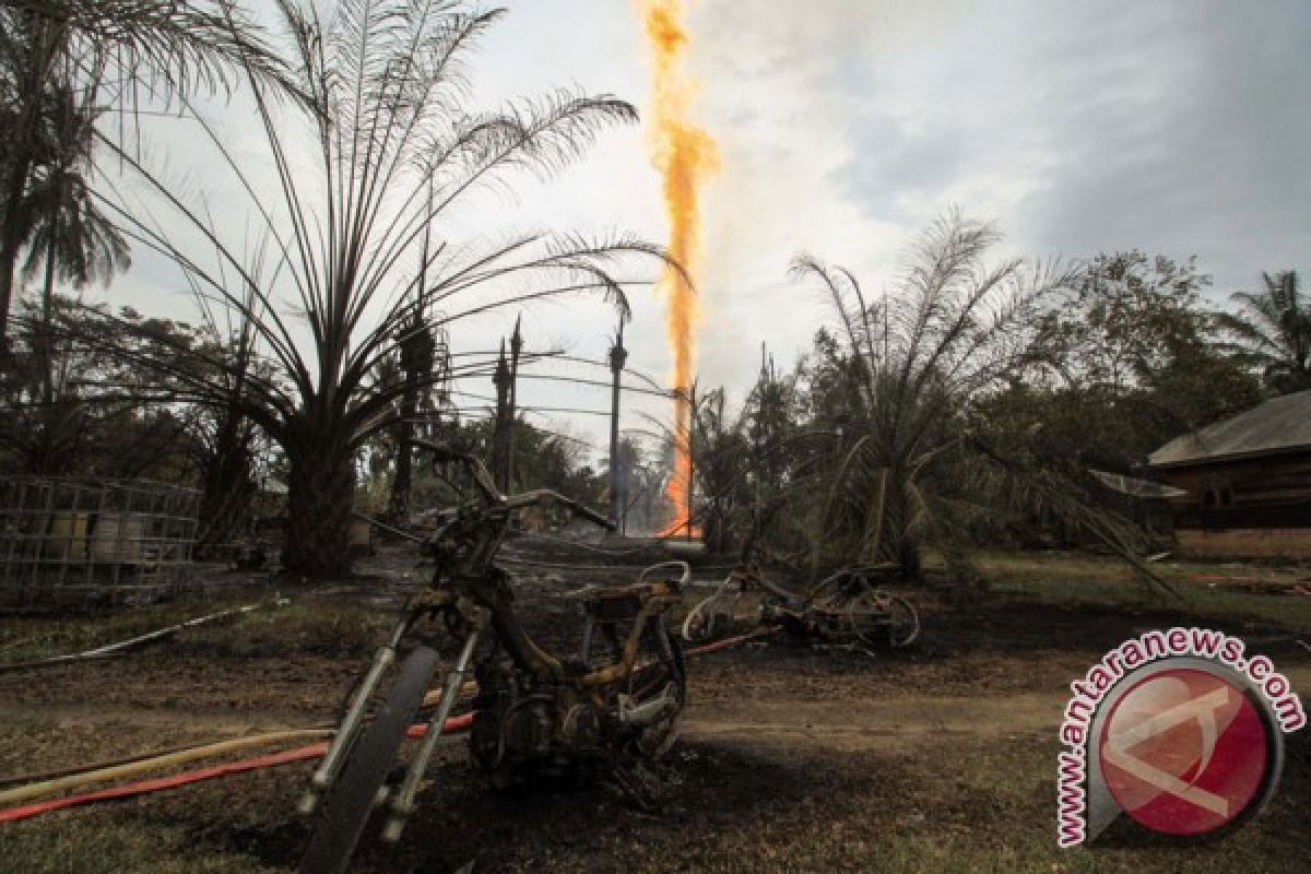 Death toll in illegal oil well explosion jumps to 15