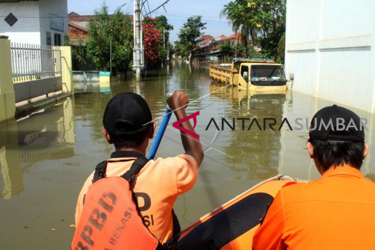 Banjir, UNBK SMP di Dharmasraya dialihkan