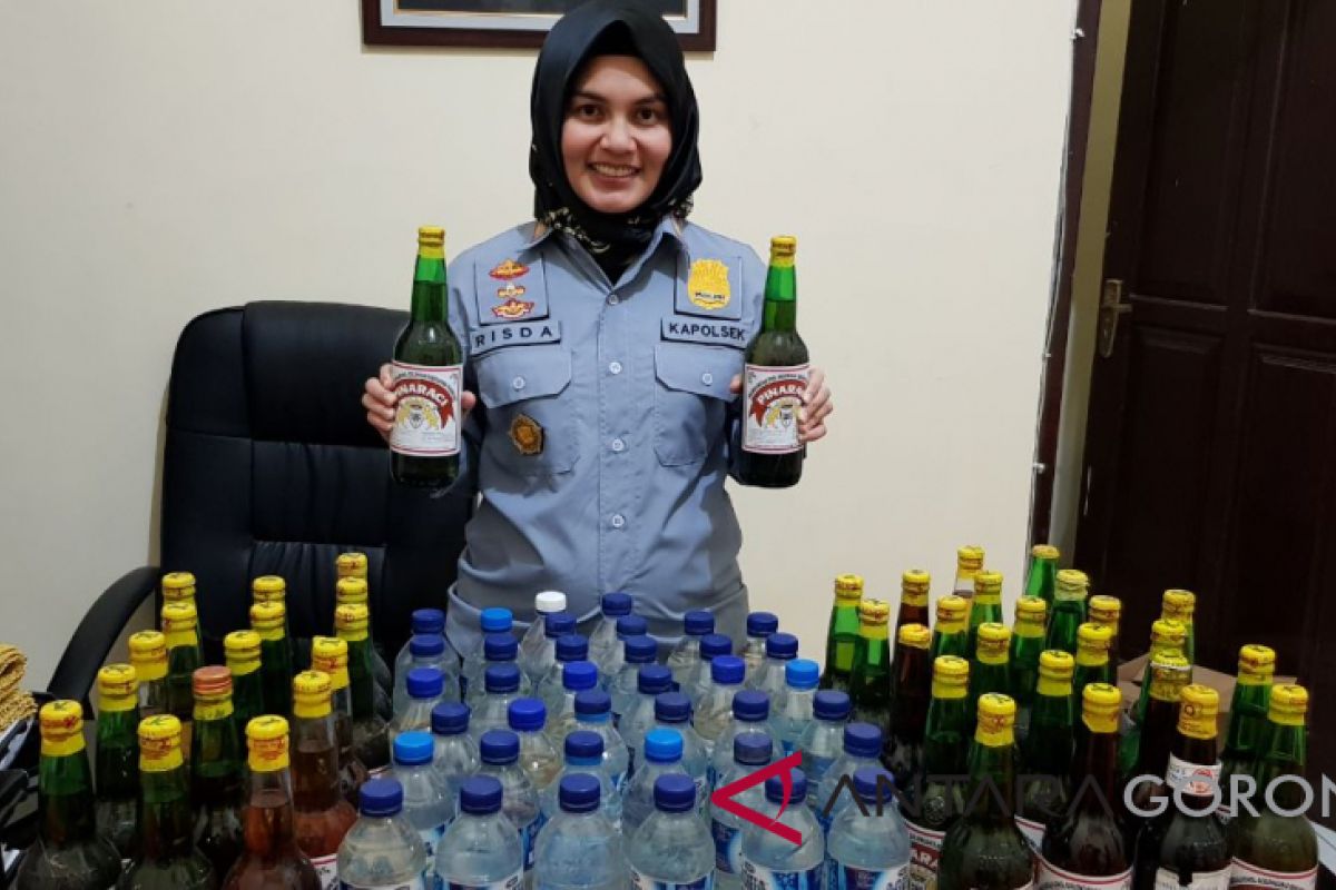 Polsek Kota Tengah Sita Puluhan Botol Minuman Keras