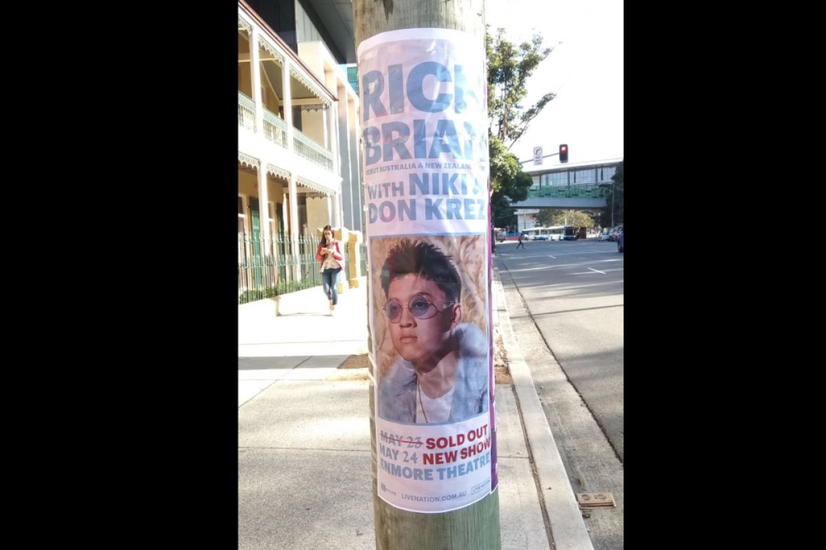 Poster konser Rich Brian dipajang di jalanan Australia