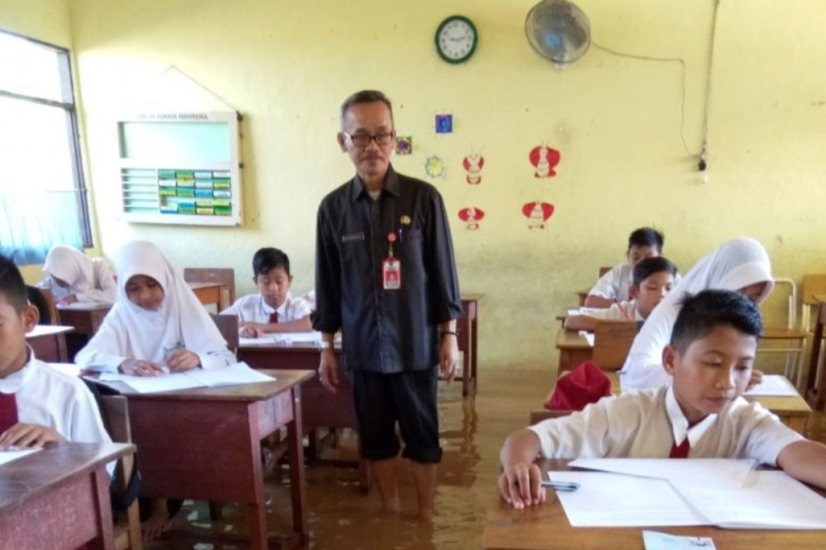 Banjir Landa Beberapa Sekolah Pelaksana USBN Di Tapin
