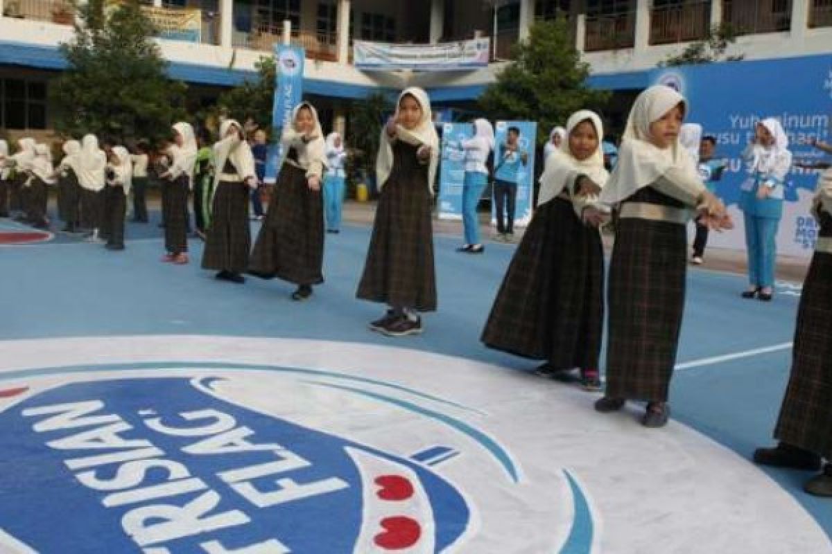 Peringati Hari Susu Sedunia, Ratusan Siswa SD Pekanbaru Olahraga Bersama Frisian Flag