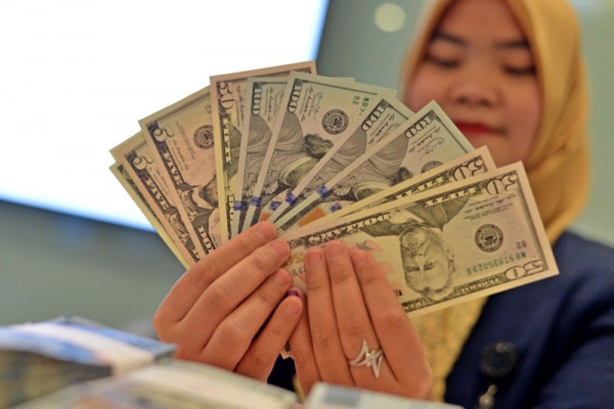 Rupiah senin pagi melemah menjadi Rp14.335