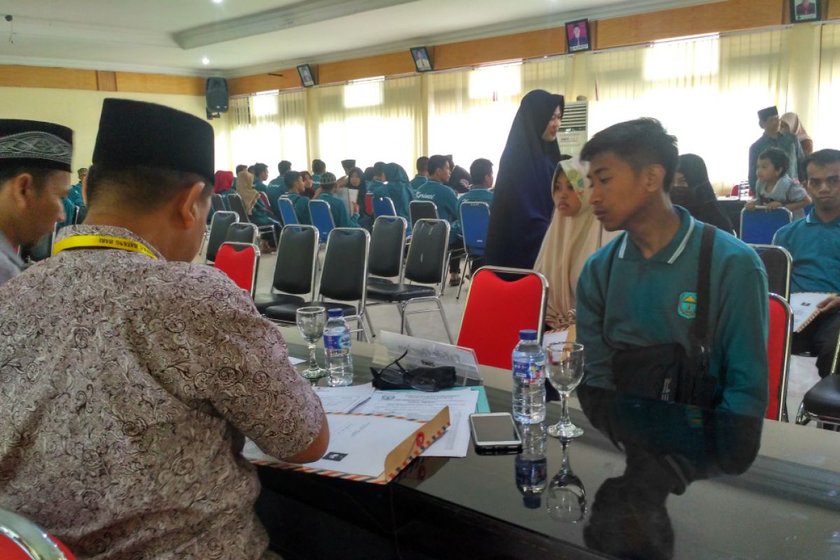 MTQ Jambi - Kontingen MTQ lakukan daftar ulang peserta