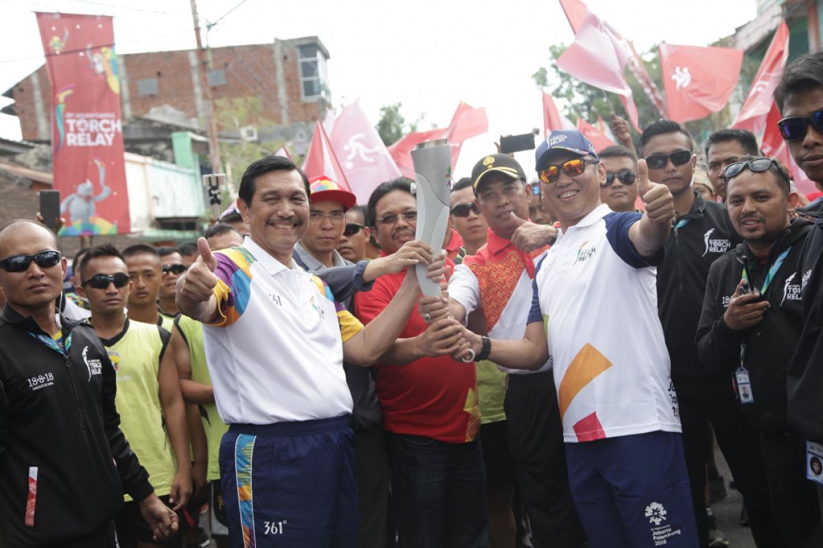 Telkomsel Sukseskan Pawai Obor Asian Games 2018 di Mataram