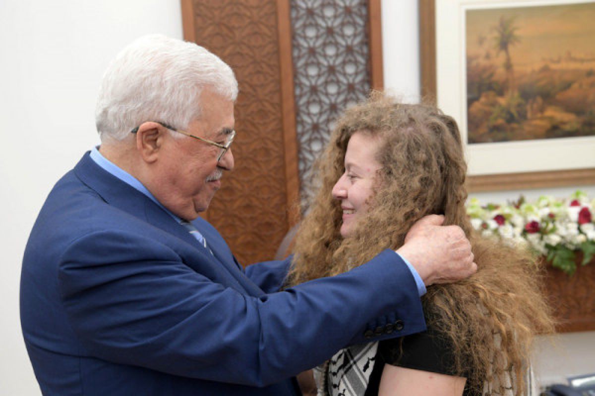 Abbas slams killing of palestinian woman by settlers as "awful crime"