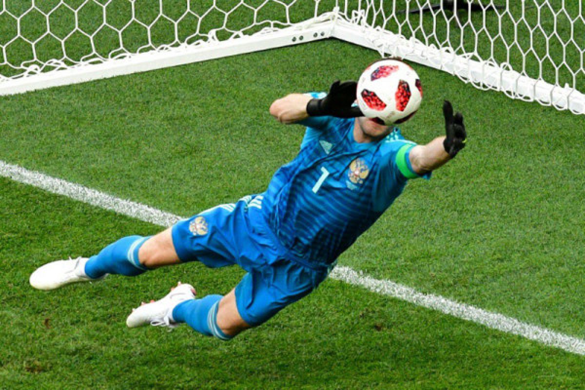 Spanyol terkena kutukan tuan rumah, ditaklukkan Rusia via adu penalti
