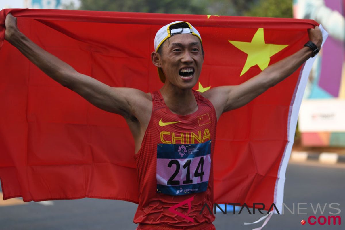 Asian Games (athletics) - men`s 20 km walk gold goes to china`s Wang