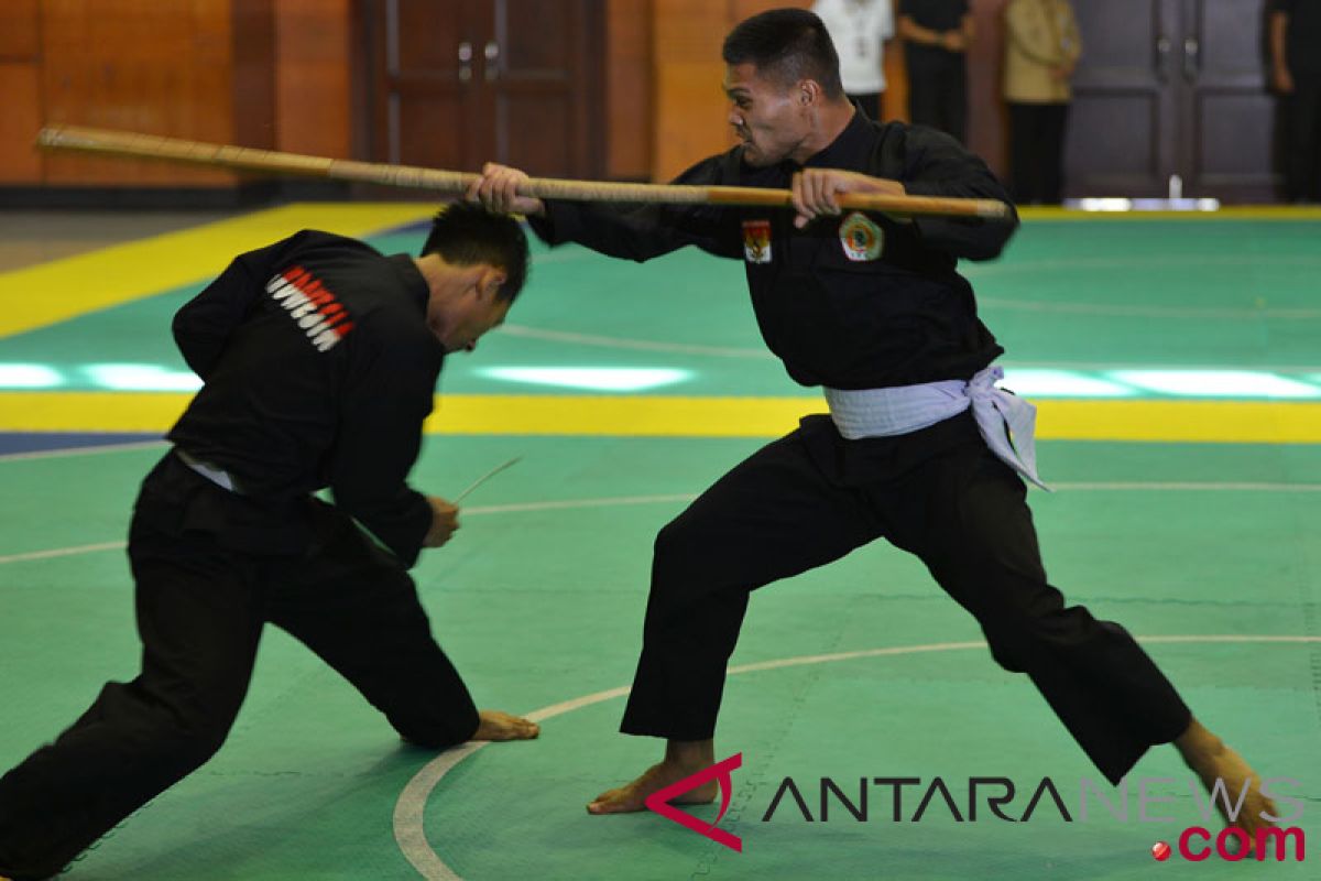 Asian Games (pencak silat) -  Abdul Malik of Indonesia beats Laos 5-0