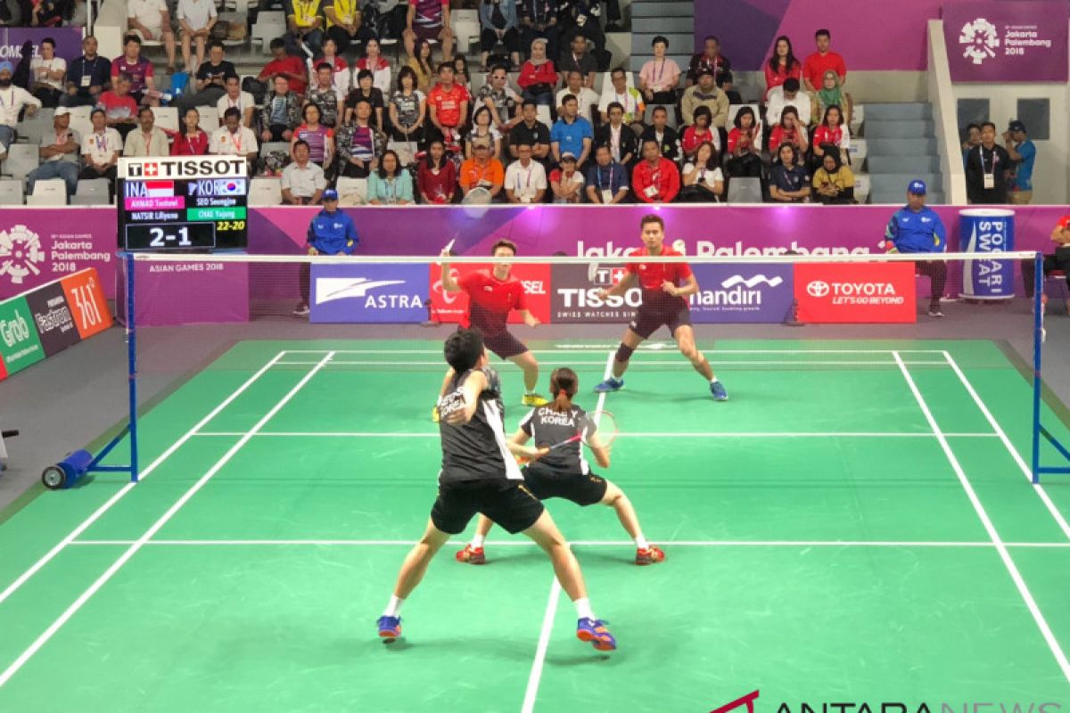 Owi/Butet lolos ke perempat final