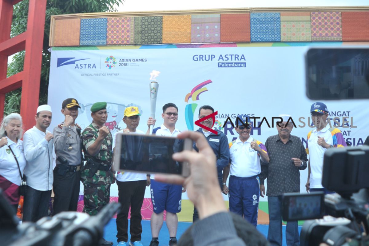 Warga antusias sambut obor Asian Games di Kampung Al Munawar
