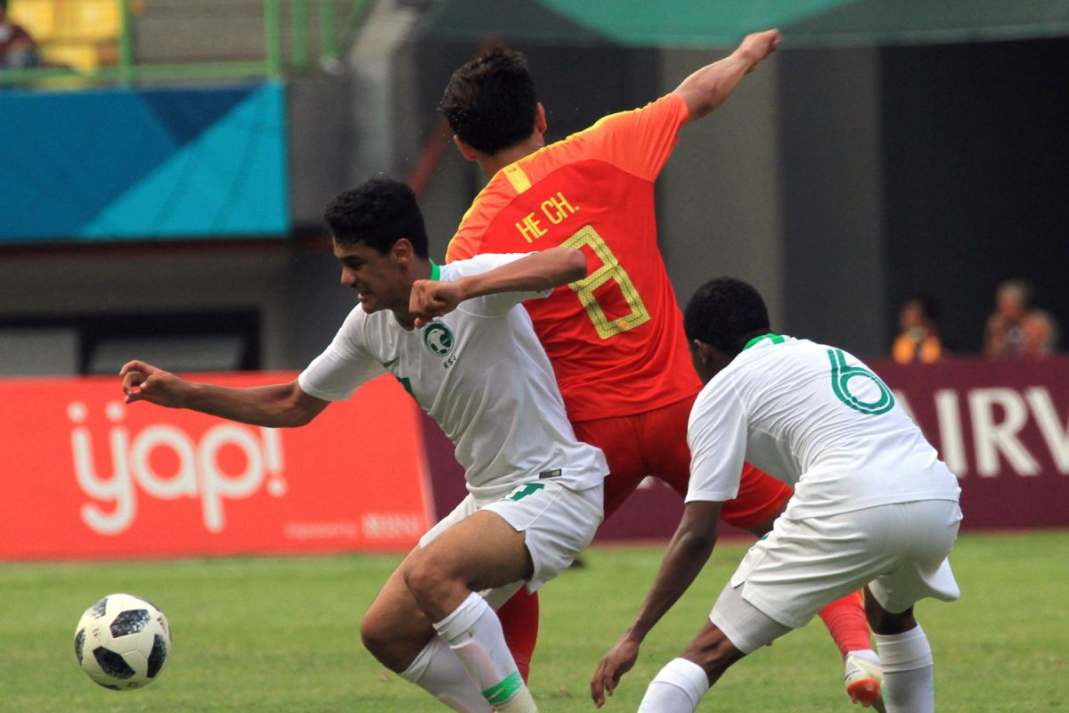 Asian Games (soccer) - Saudi qualifies for quarter finals after defeating China 4-3