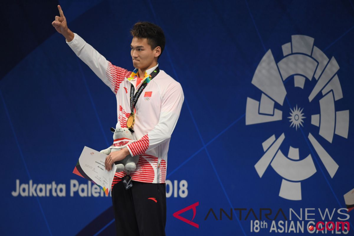 Asian Games (swimming) - China wins gold in men`s 100-m backstroke