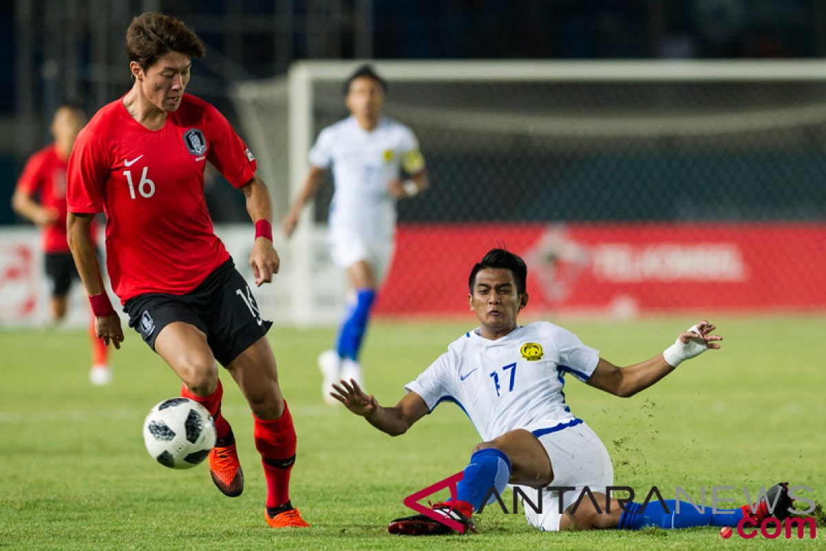 Asian Games (soccer) - Malaysia beat South Korea 2-1