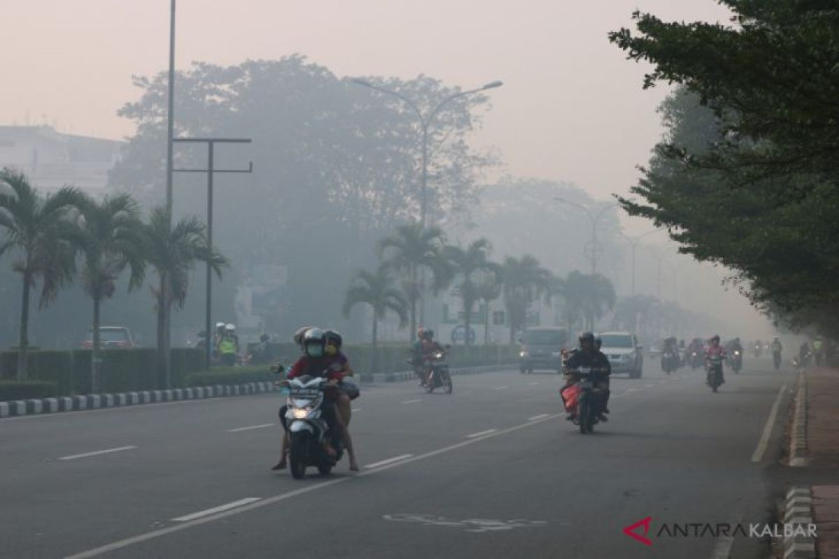 Mencoba hidup berdamai dengan kabut asap