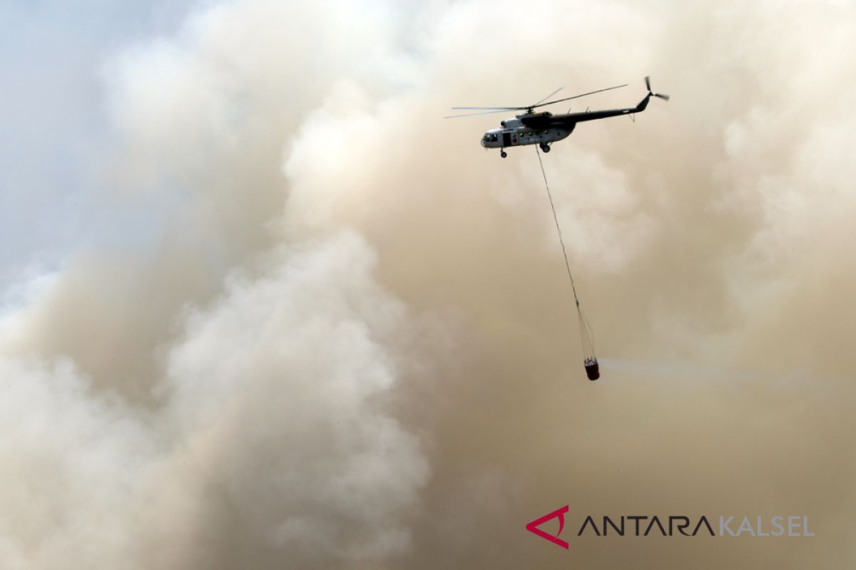 Two helicopters put out five hectares of burned land in Jejangkit