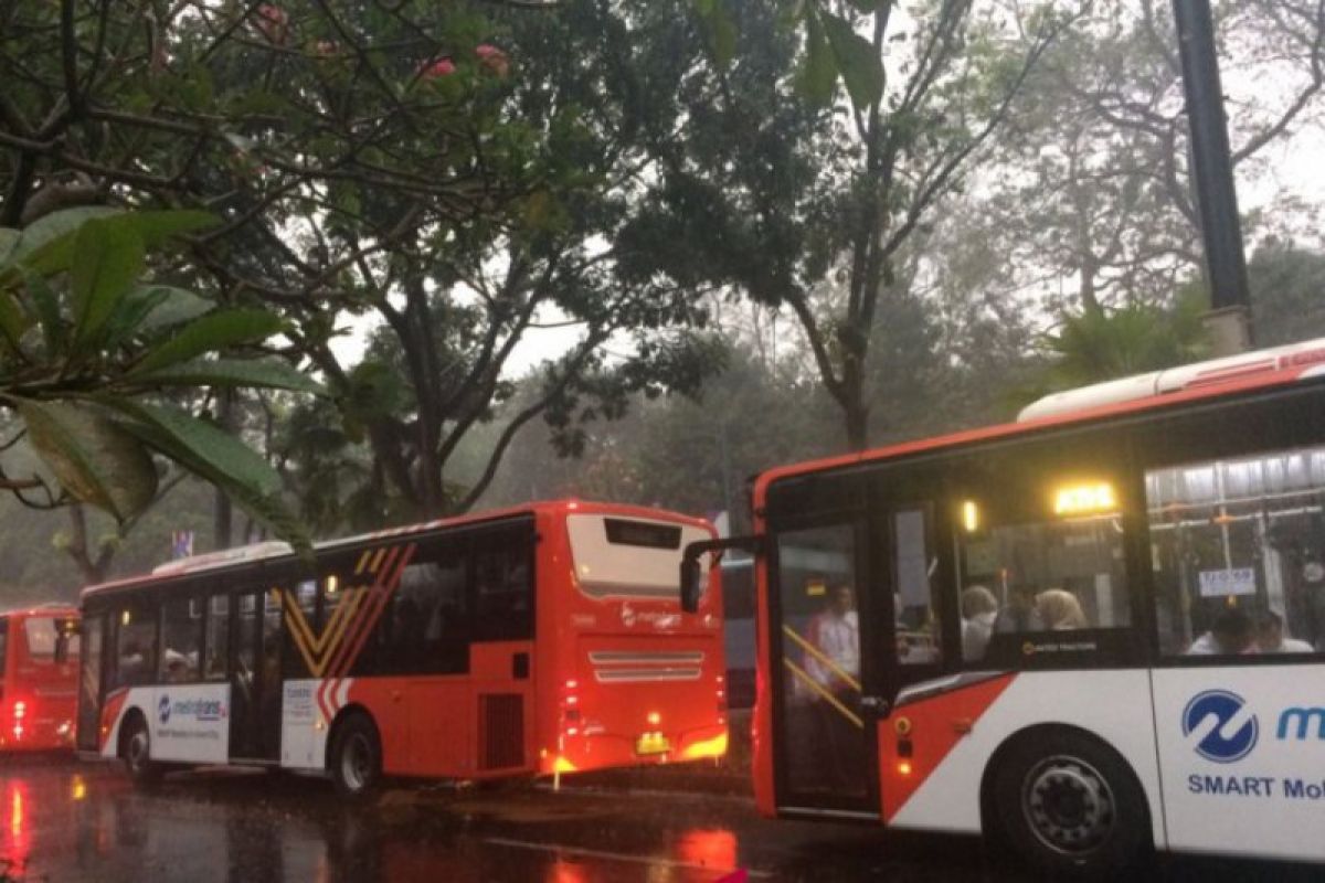 Asian Games - Atlet tertahan di bis akibat hujan deras guyur GBK
