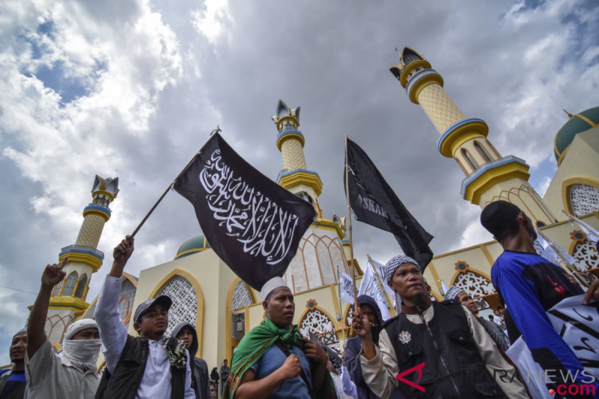 Aksi demo pembakaran bendera berkalimat tauhid  di Tanjungpinang