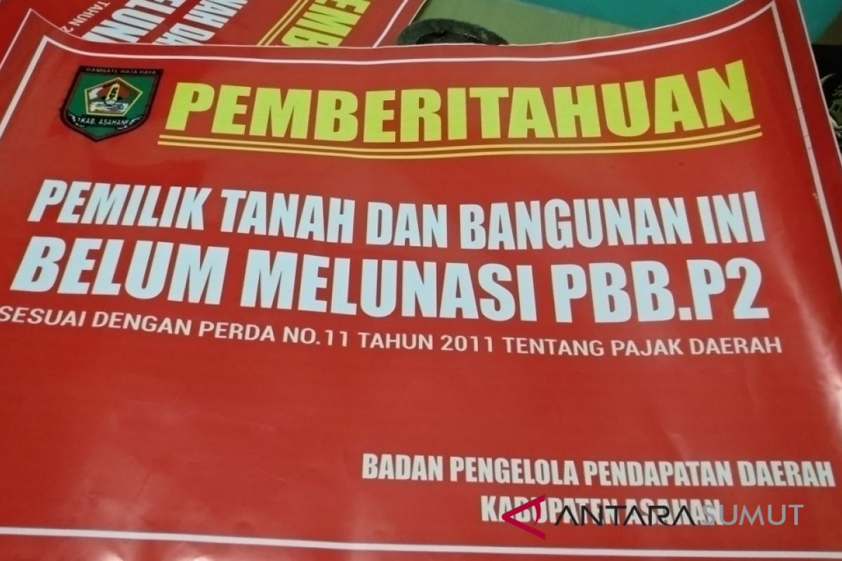 Bapenda Asahan pasanag stiker peringatan kepada penunggak PBB