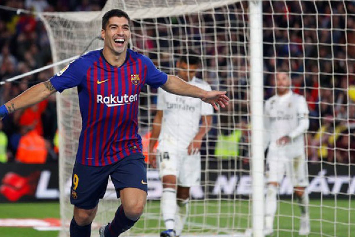 Suarez membawa Barcelona lolos ke final Piala Raja usai melibas Real Madrid 3-0