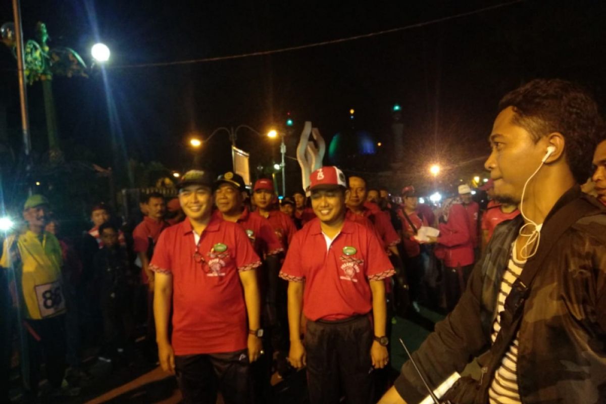 Hari Jadi Pamekasan, Ratusan Orang Mengikuti Gerak Jalan Palapa