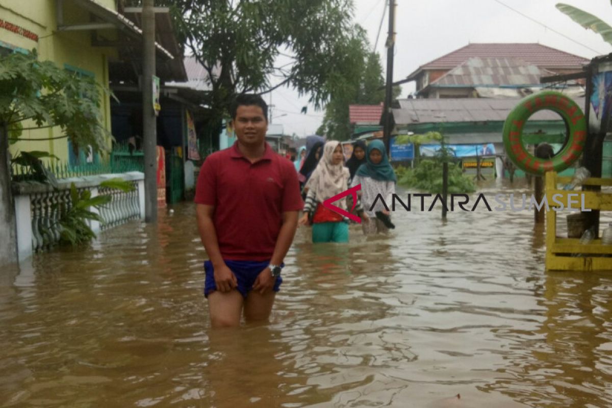 Banjir parah bangunkan tidur warga Palembang