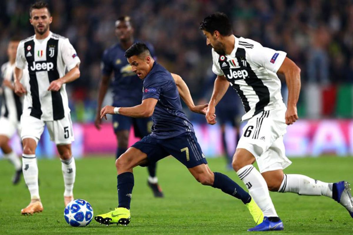 Dua gol menit akhir Manchester United amankan tiga poin di markas Juventus