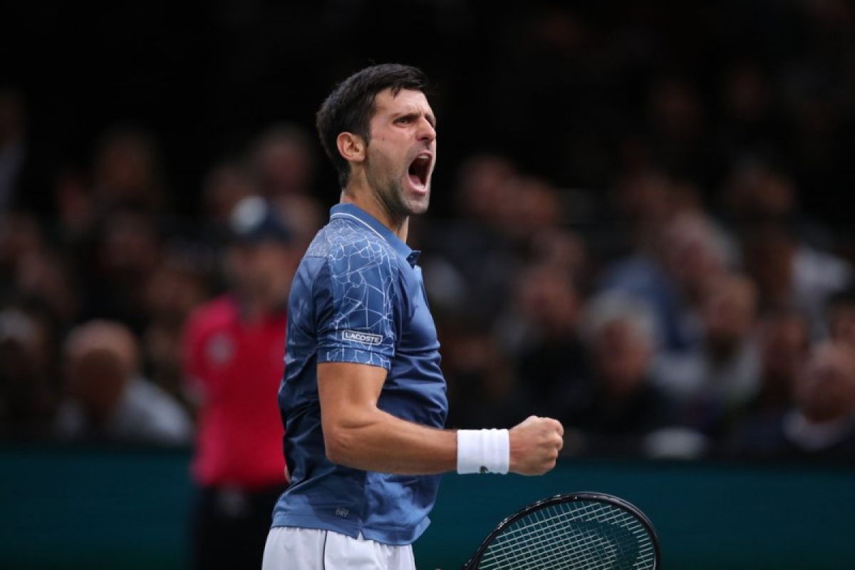 Djokovic tundukkan Isner di ATP finals