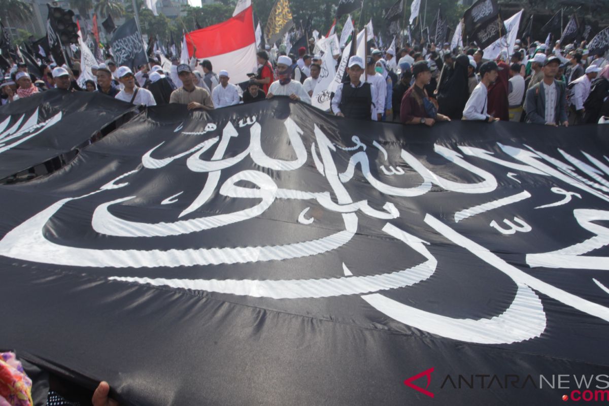 Government, Islamic organizations agree not to prohibit Tauhid flag