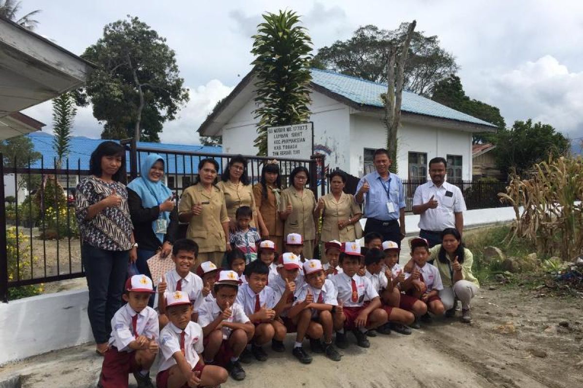 TPL bangun pagar sekolah SD 177073 Lumban Sirait