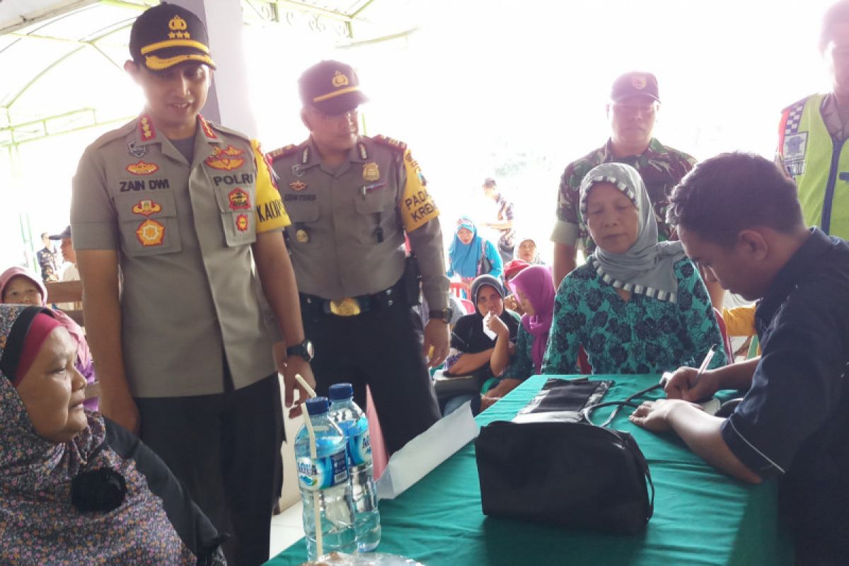 Polresta Sidoarjo Bantu Pemeriksaan Kesehatan Warga Krembung