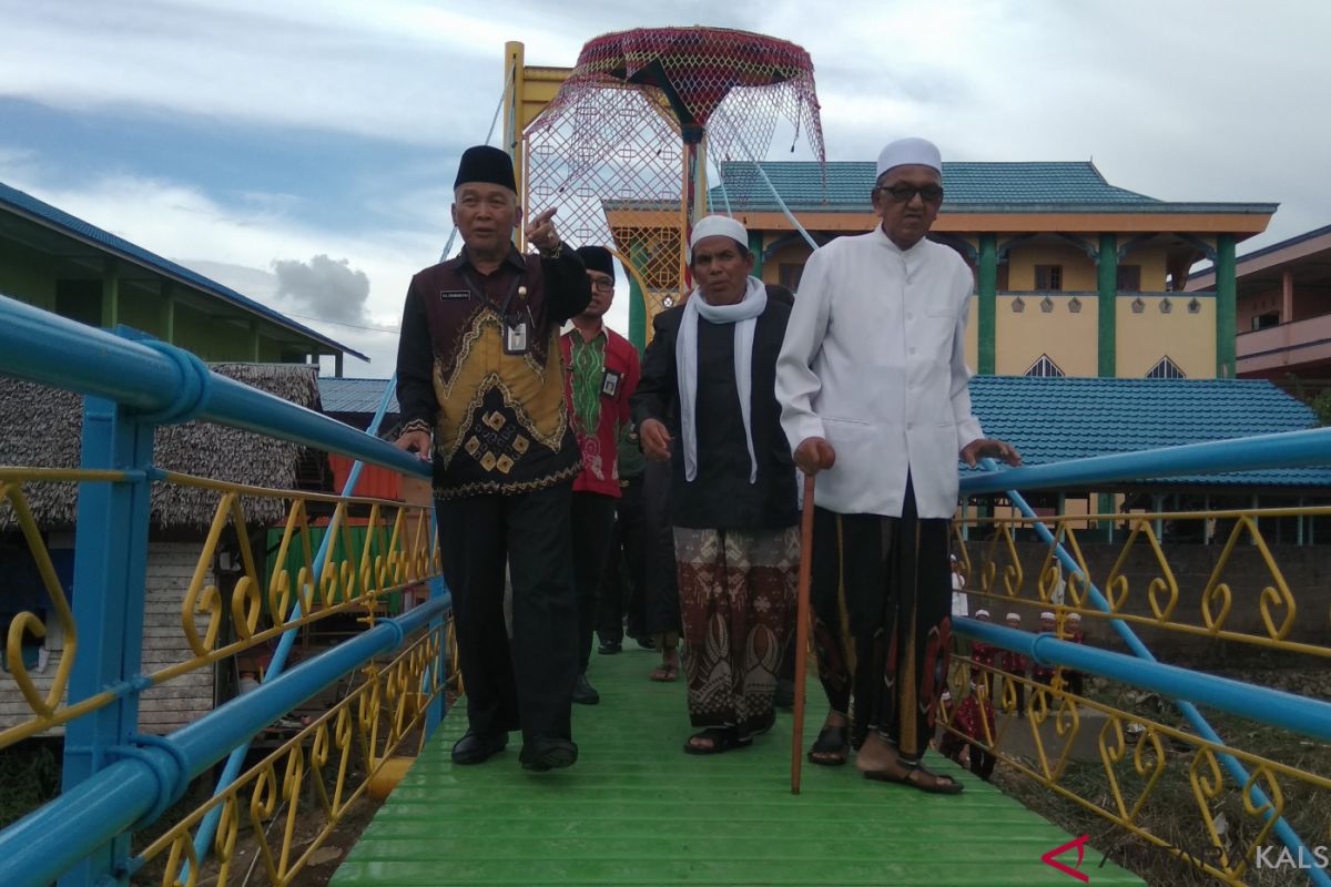 Pemangkih residents have a cable stayed bridge