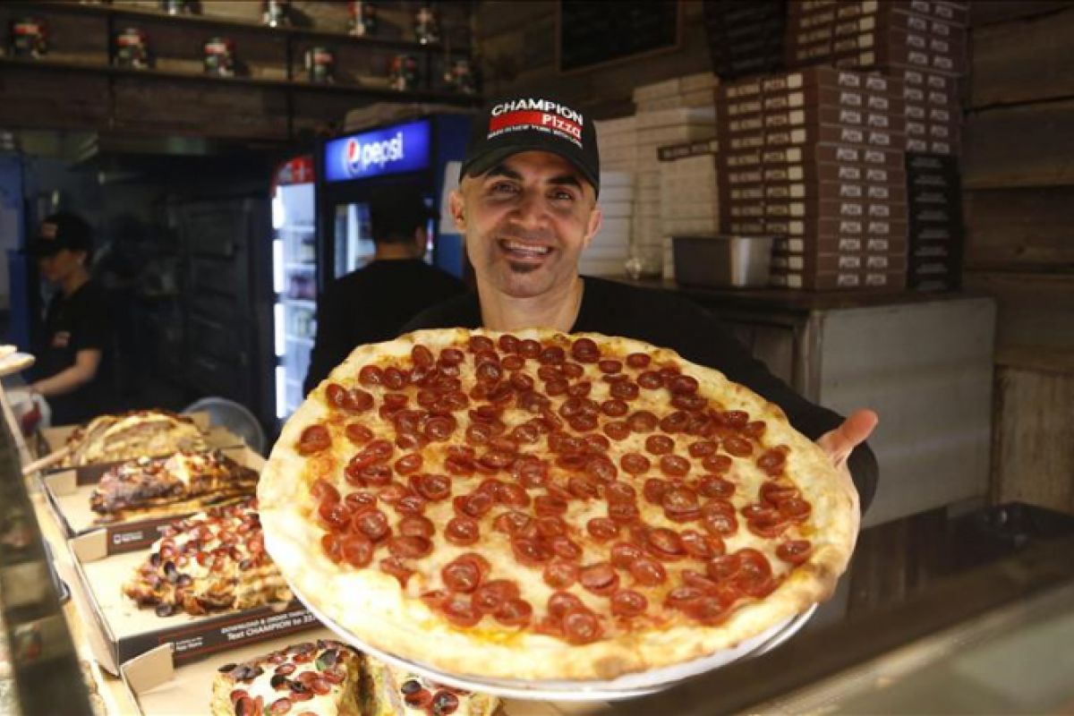 Pembuat pizza Turki diberi penghargaan karena jadi imigran yang berhasil