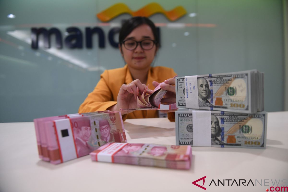 Rupiah Jumat pagi melemah menjadi Rp14.209