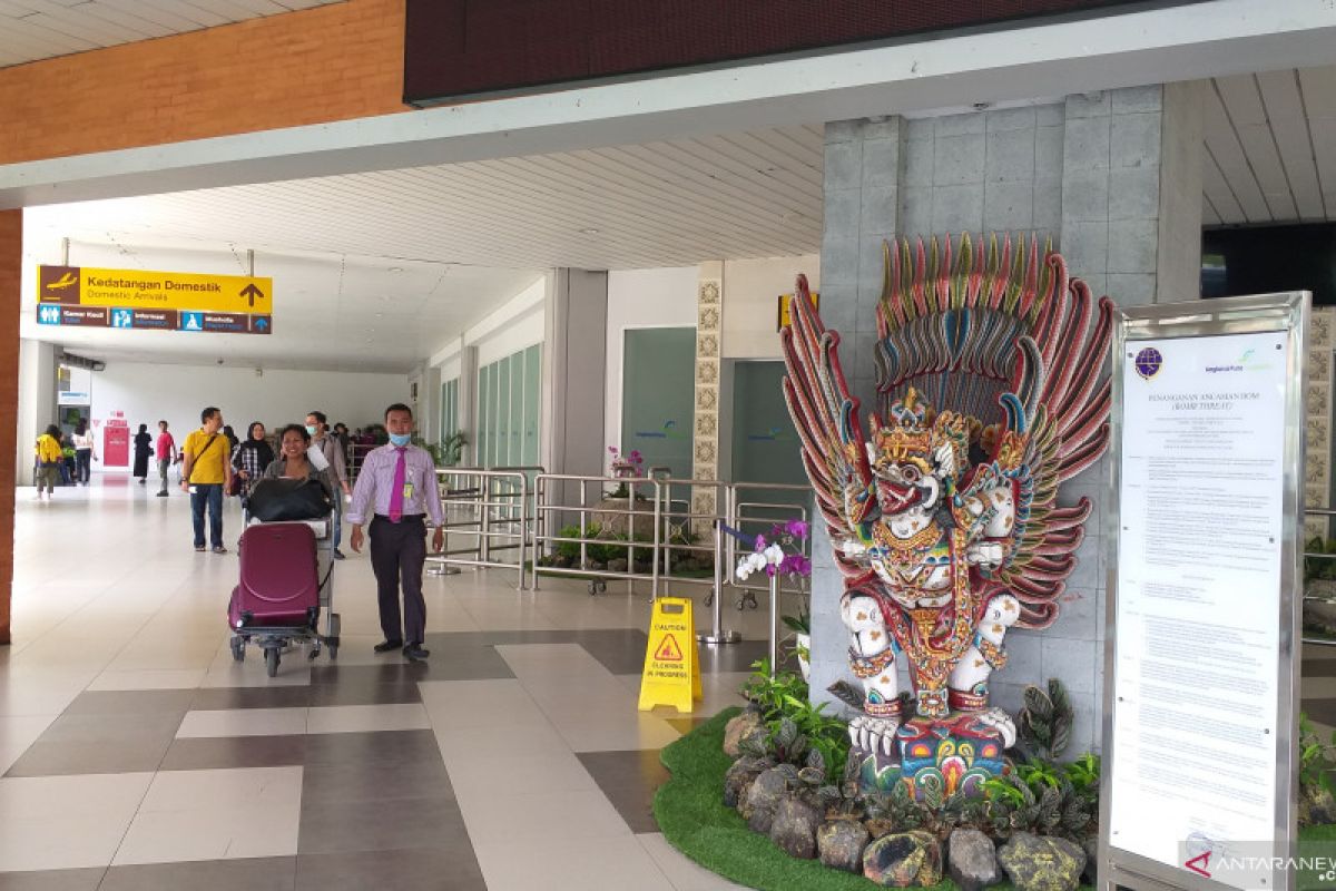 Pagi, terminal keberangkatan domestik Ngurah Rai beroperasi