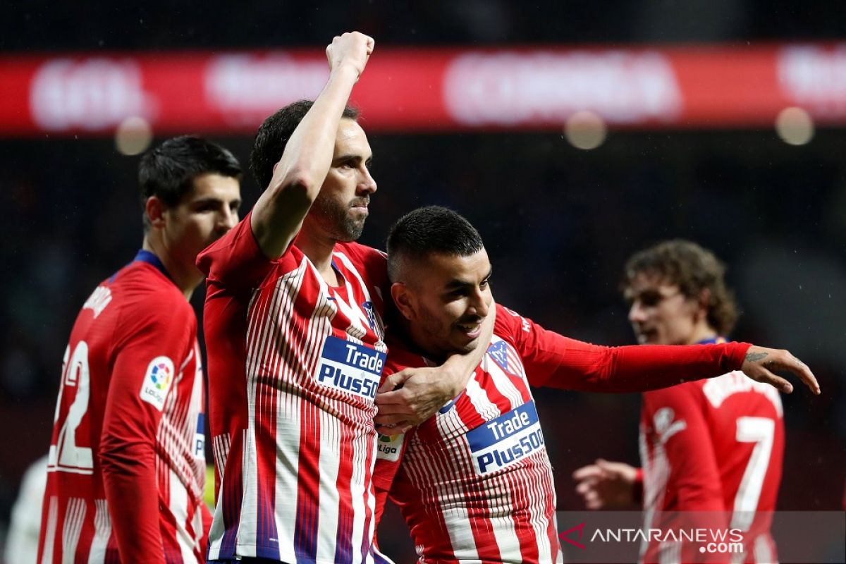 Atletico kalahkan Valensia 3-2 , tunda pesta juara Barca