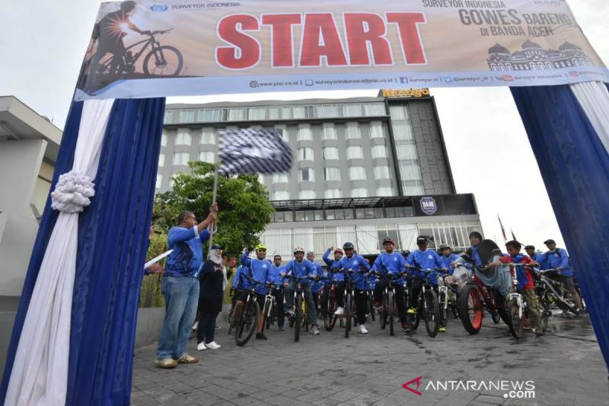 PT Surveyor Indonesia gowes bareng klien di Banda Aceh