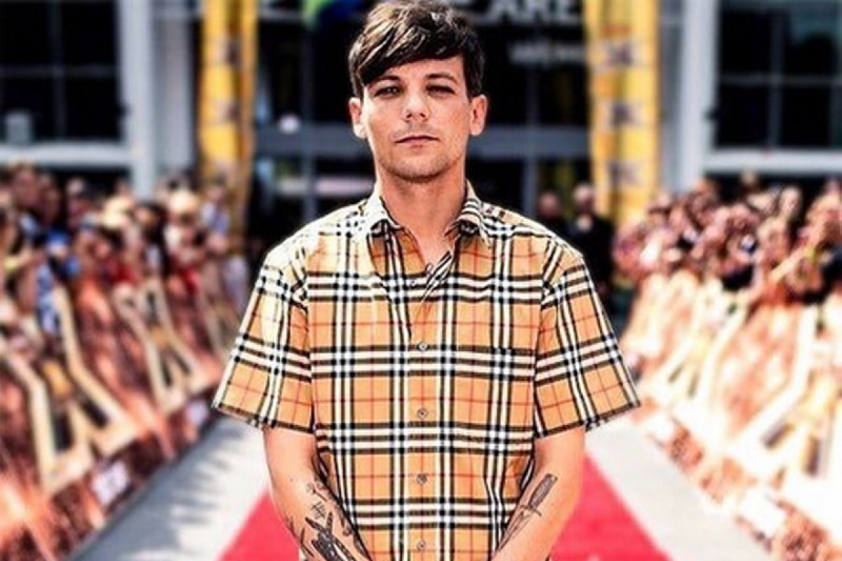 Penyanyi Louis Tomlinson isyaratkan One Direction kembali