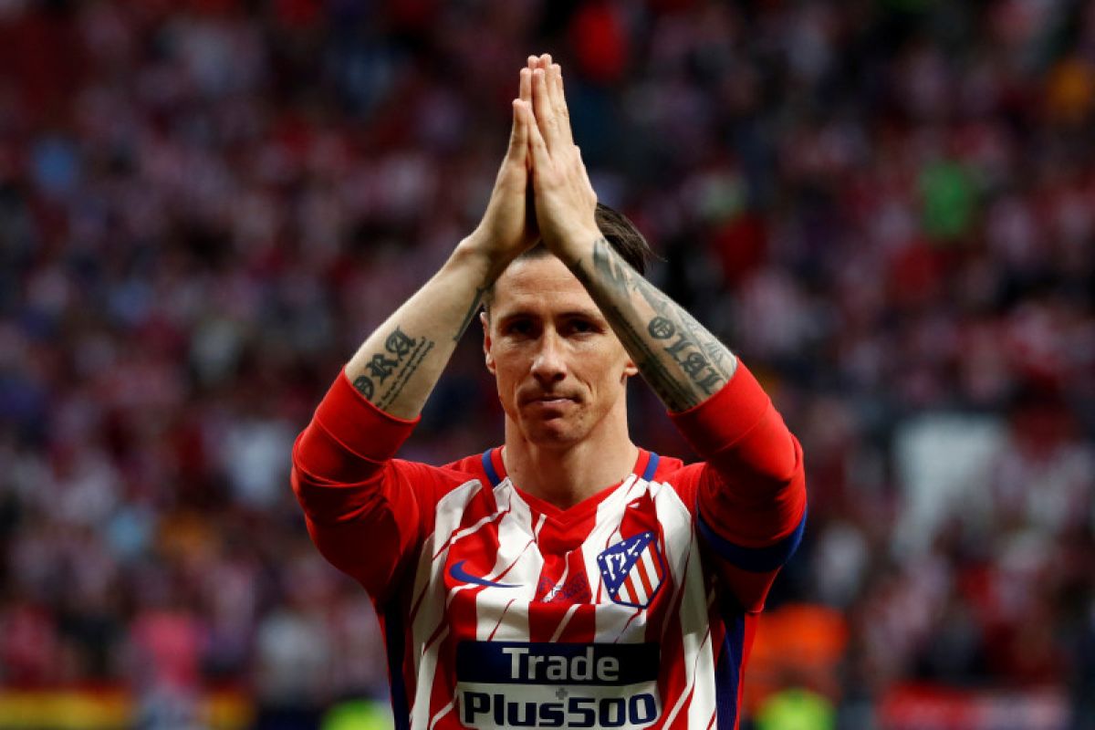 Fernando Torres gantung sepatu