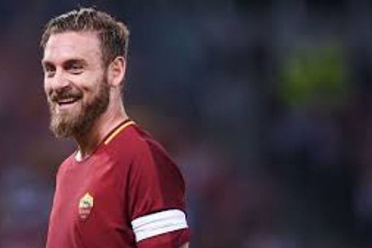 De Rossi gabung ke Boca Junior setelah 18 tahun bersama Roma