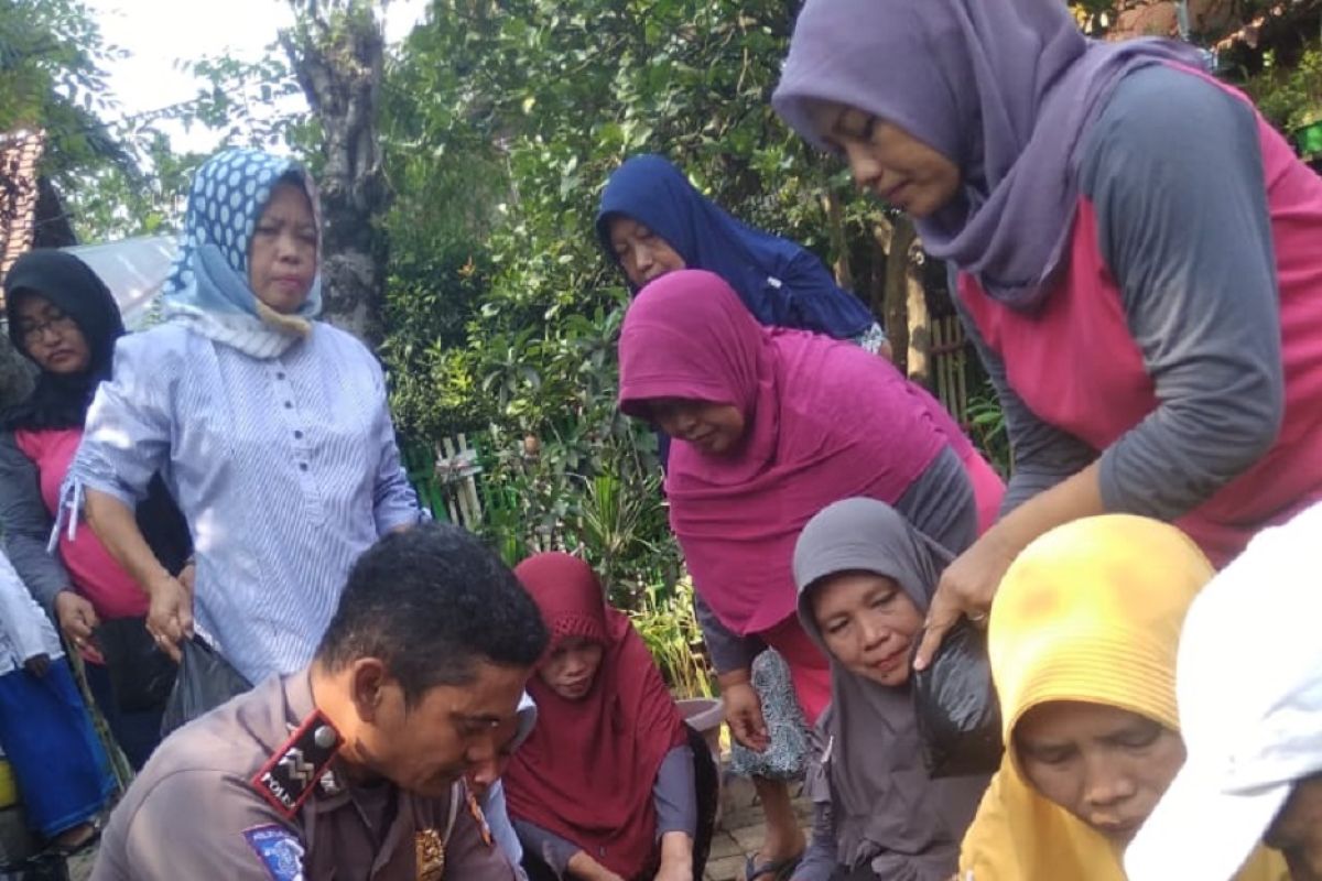 Haru Aiptu Eko  berhasil membuat kampung tematik bersama warga