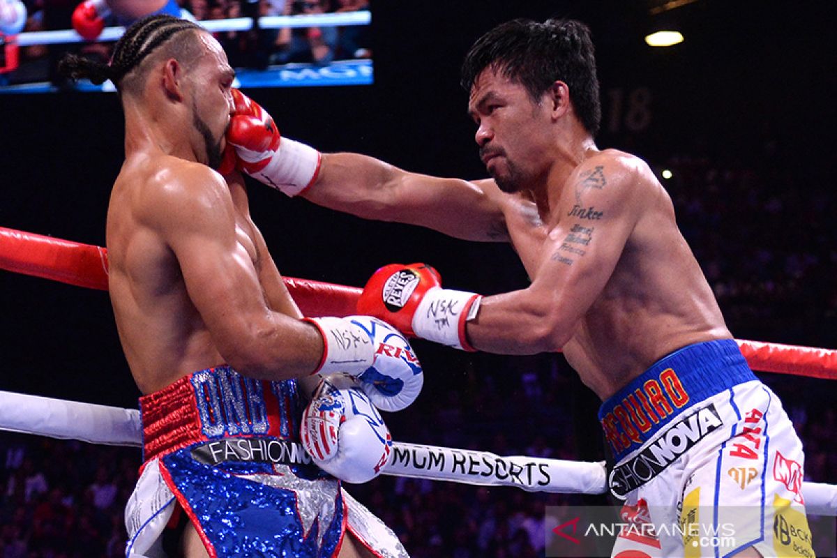 Kubu Manny Pacquiao pertimbangkan gelar pertarungan lawan McGregor