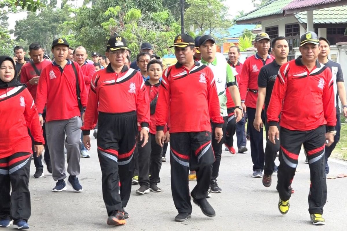 Meriahkan Hari Bhakti Adhyaksa ke - 59, Bupati Inhil ikuti jalan santai