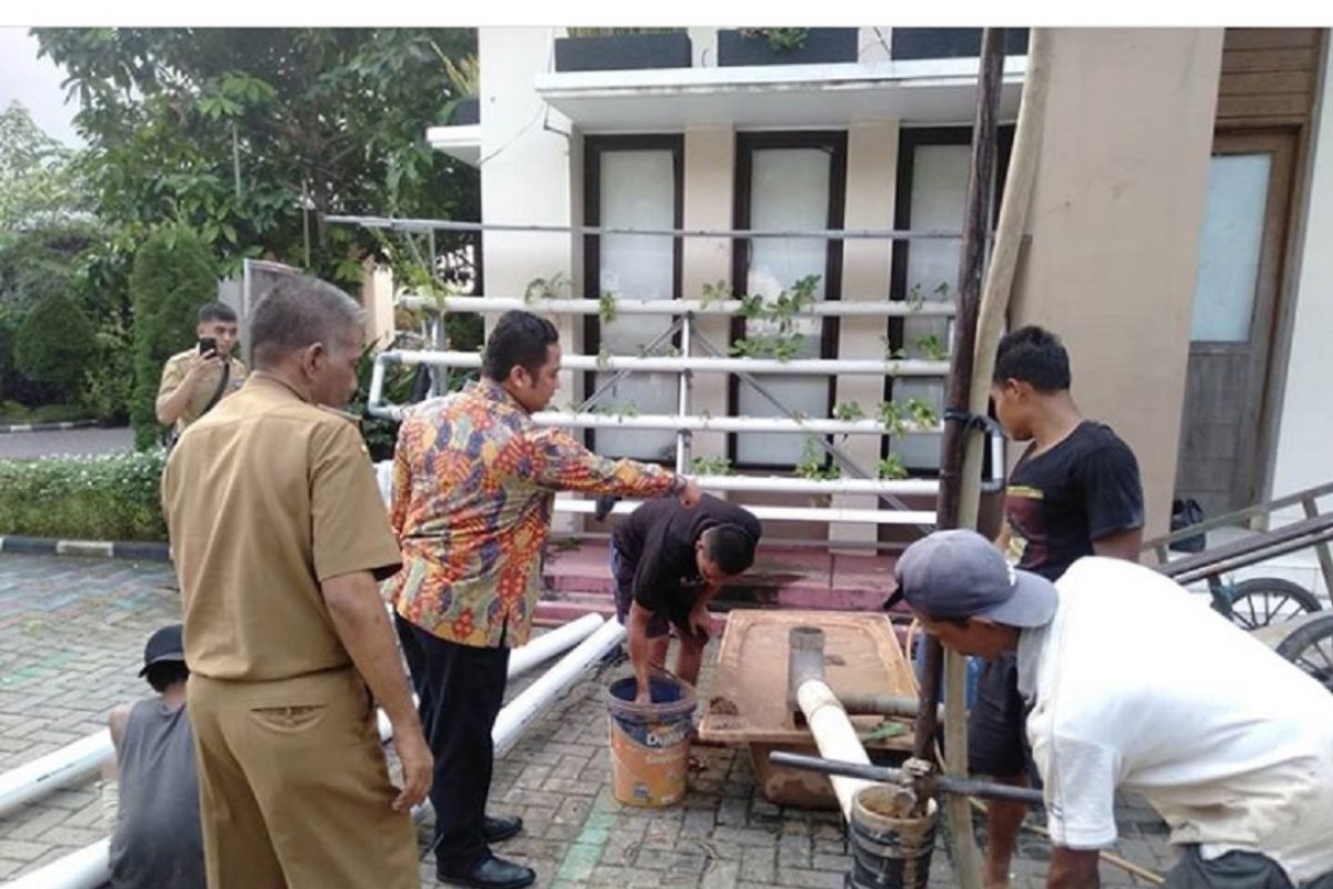 Pemkot Tangerang buat sumur resapan  atasi genangan di permukiman warga