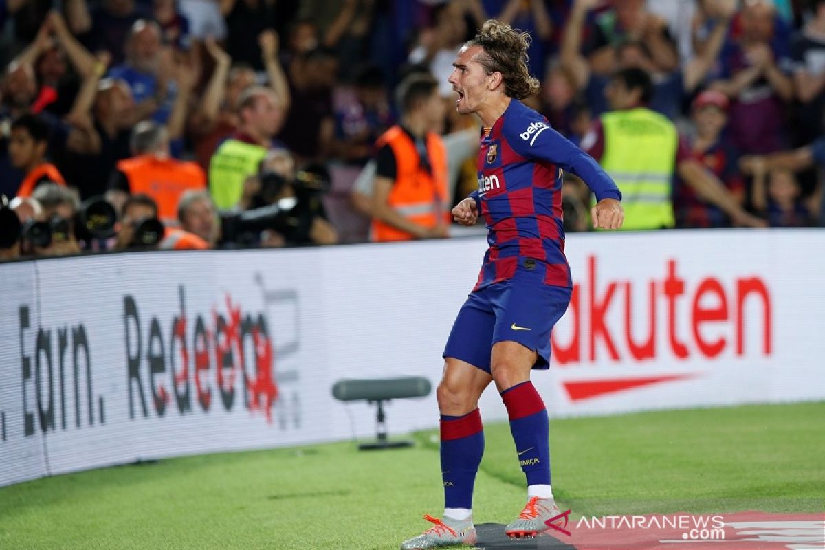 Antoine Griezmann sumbang dua gol saat Barcelona kalahkan  Real Betis 5-2