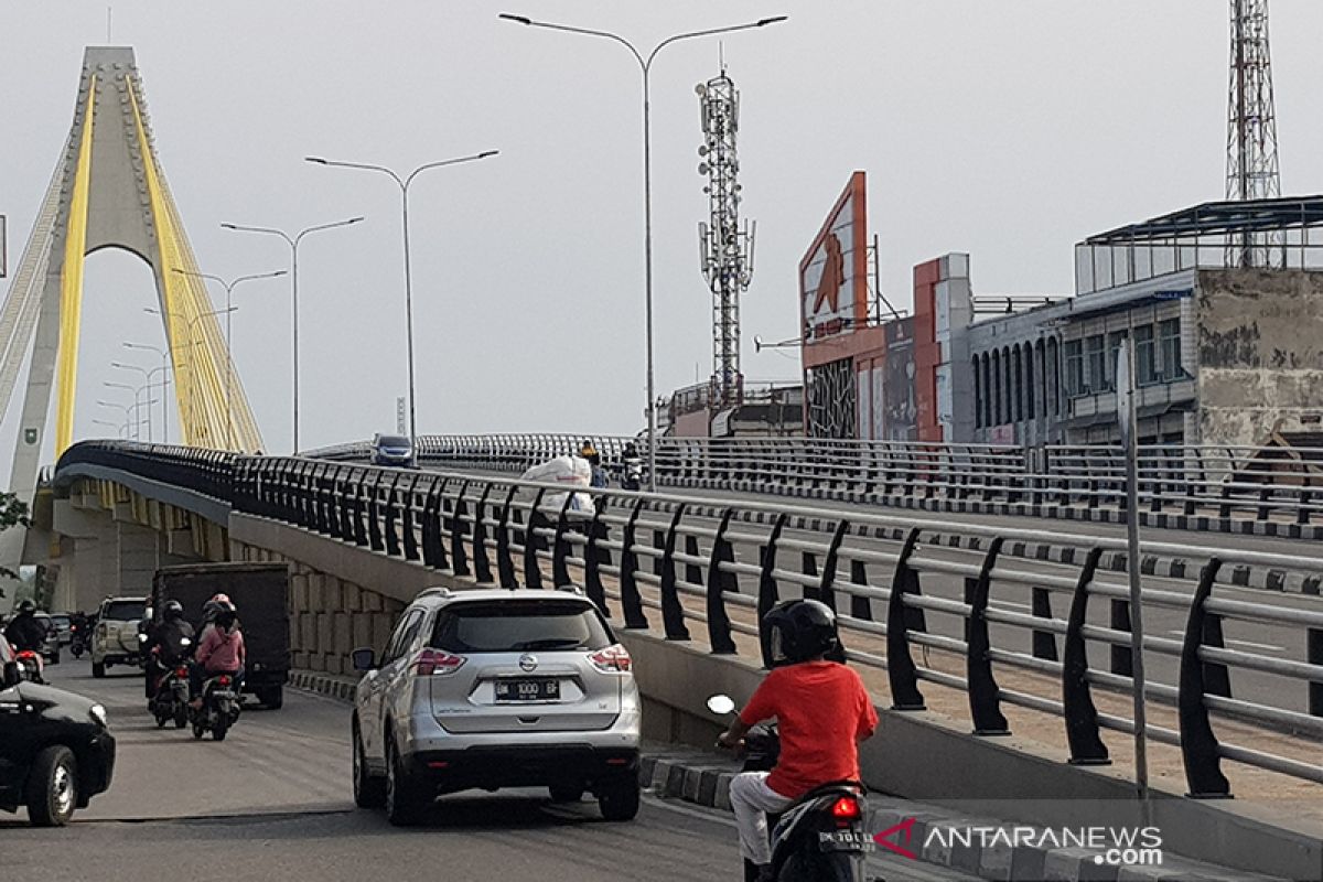 Hujan hapus asap karhutla di Riau