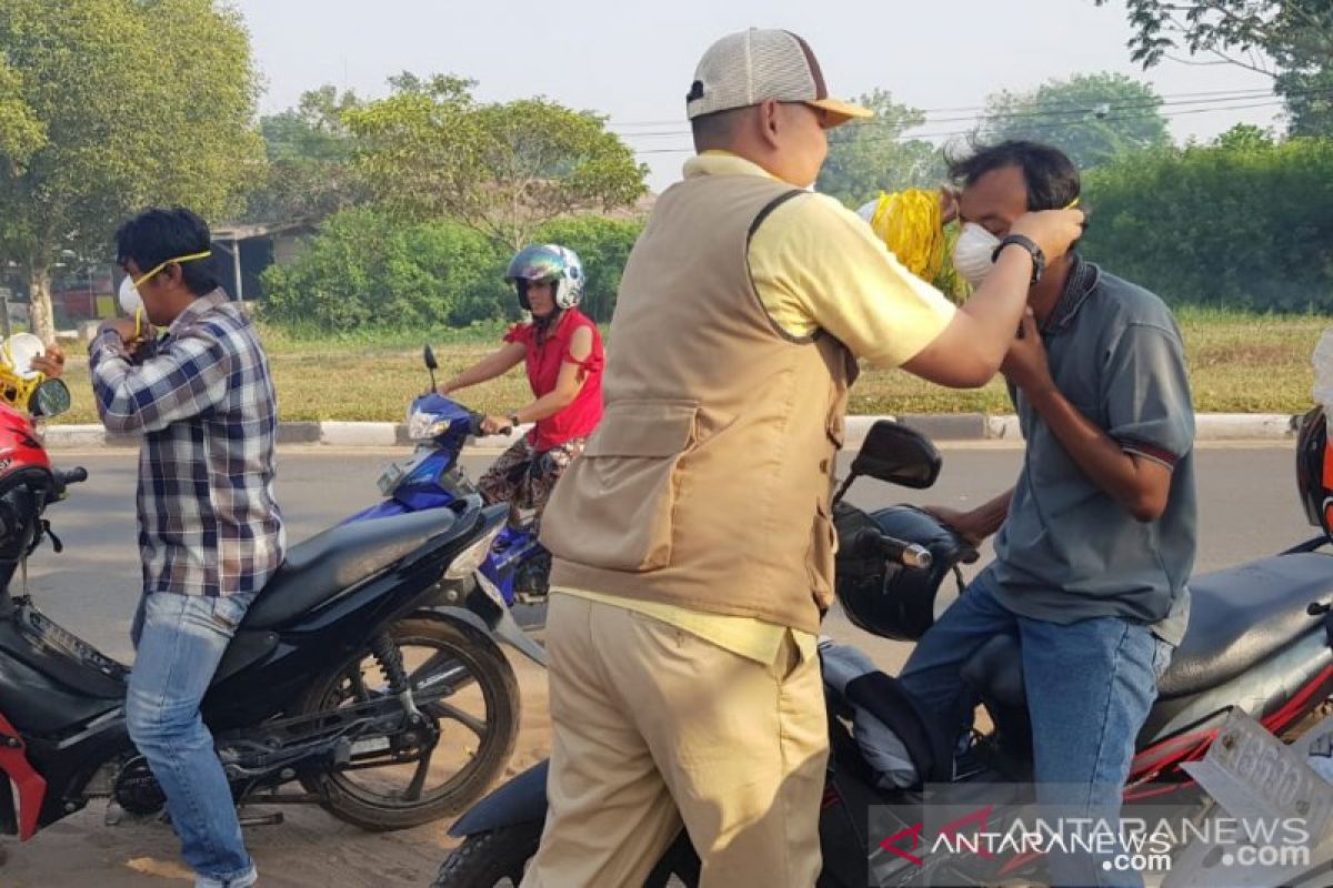 Kabut asap, warga Sumsel diimbau gunakan masker