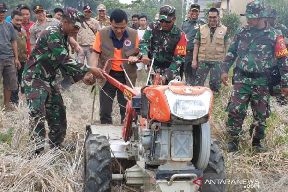 Hand tractor modification a solution to avoid land fire in HSS