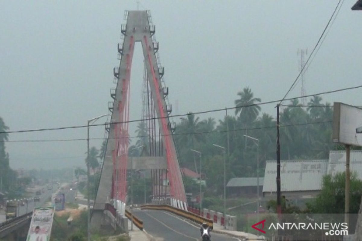 Kabut asap selimuti Dharmasraya, Disdik: pelajar belum diliburkan