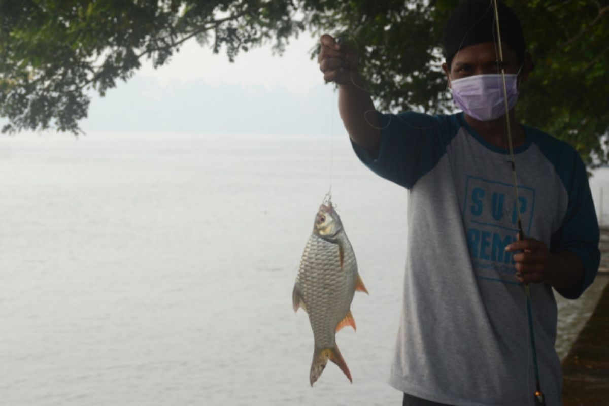 Pemancing Kaltara bermasker